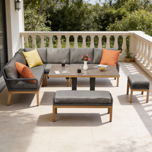 Exposed-frame outdoor corner sofa with cushions, dining table and stools